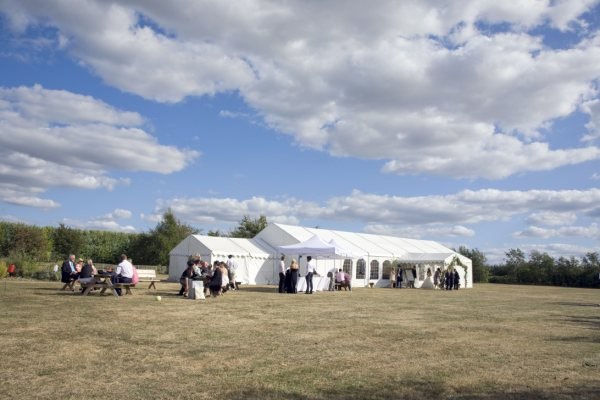 Reception marquees in the meadow at Brogdale Collections