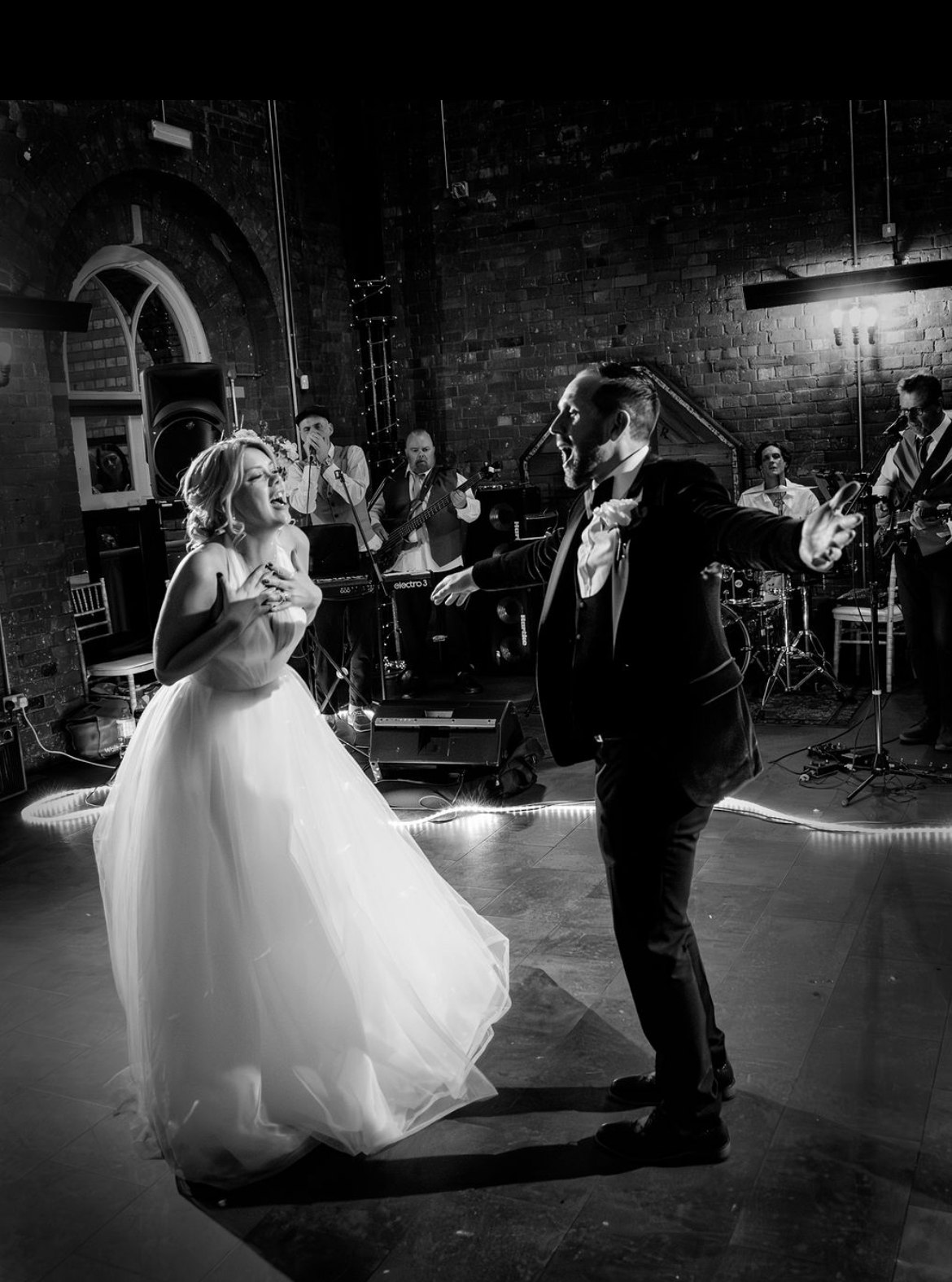 A couple dancing at their reception at Copper Rivet Distillery