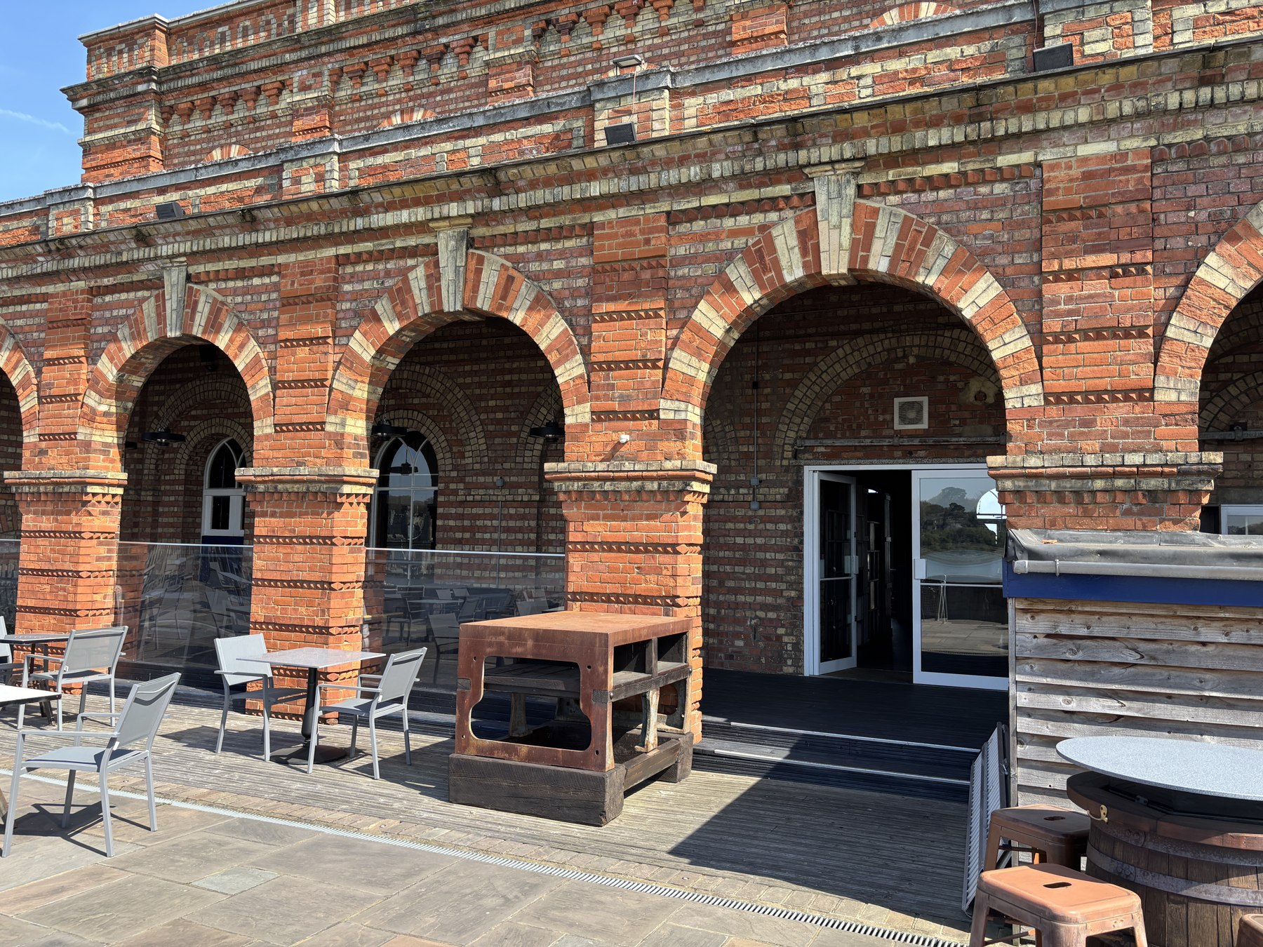 The riverside terrace outside the distillery at Copper Rivet Distillery