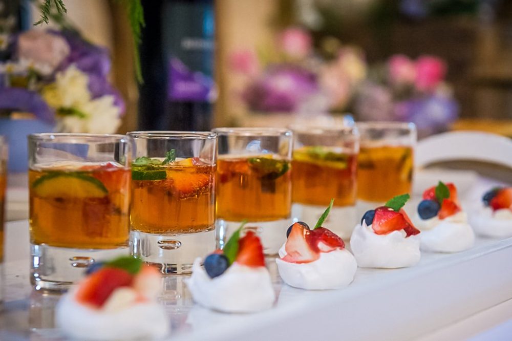 Jugs of Pimms poured in the garden hour
