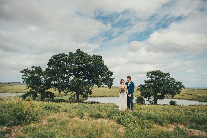 A couple in the open countryside at Elmley Nature Reserve