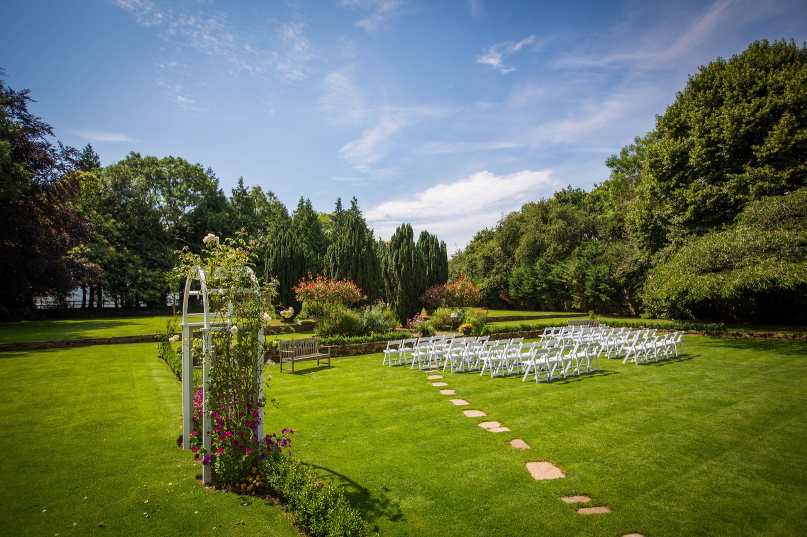 An outdoor ceremony set on the lawns at Hayne House