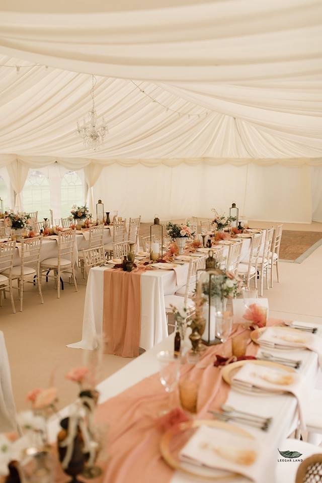 Wedding tables inside the marquee at Knowlton Court