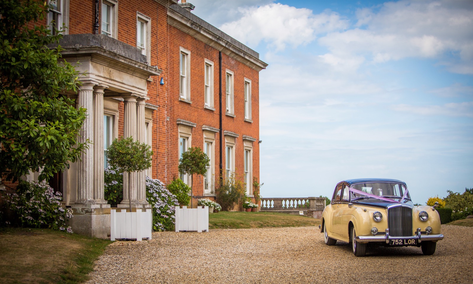 Mount Ephraim manor house with a vintage wedding car