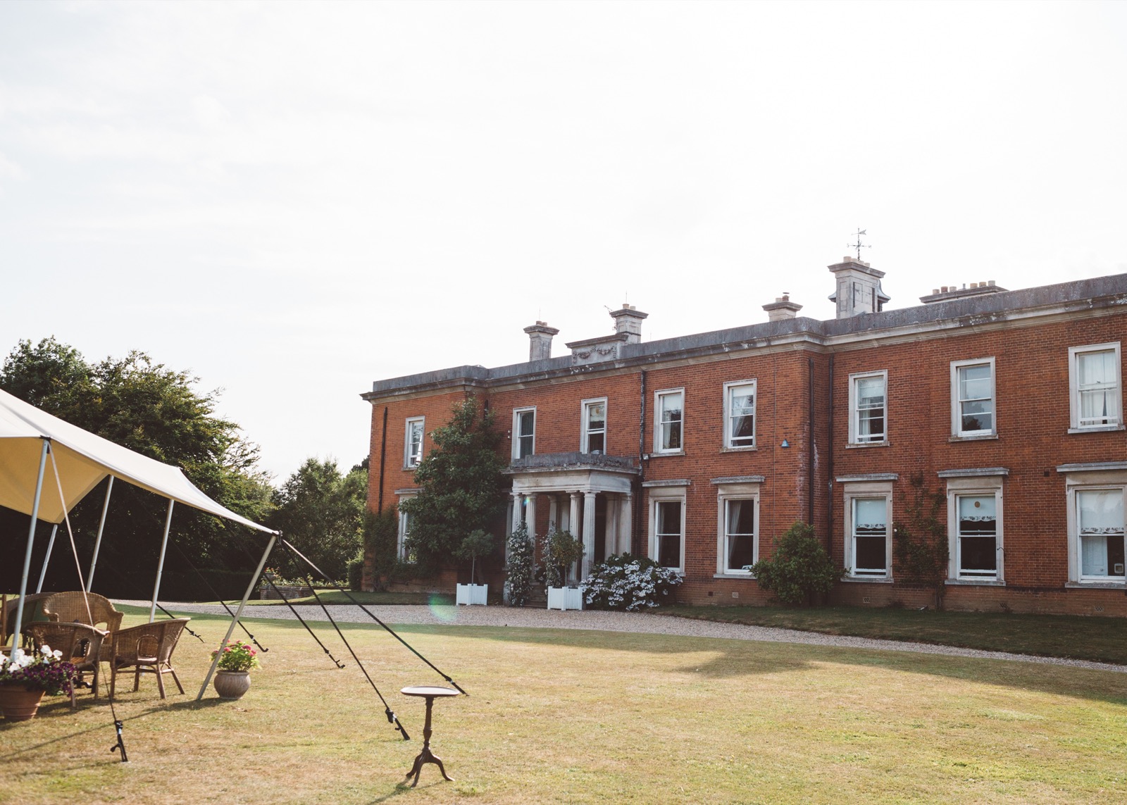 The manor house and a marquee on the lawn at Mount Ephraim