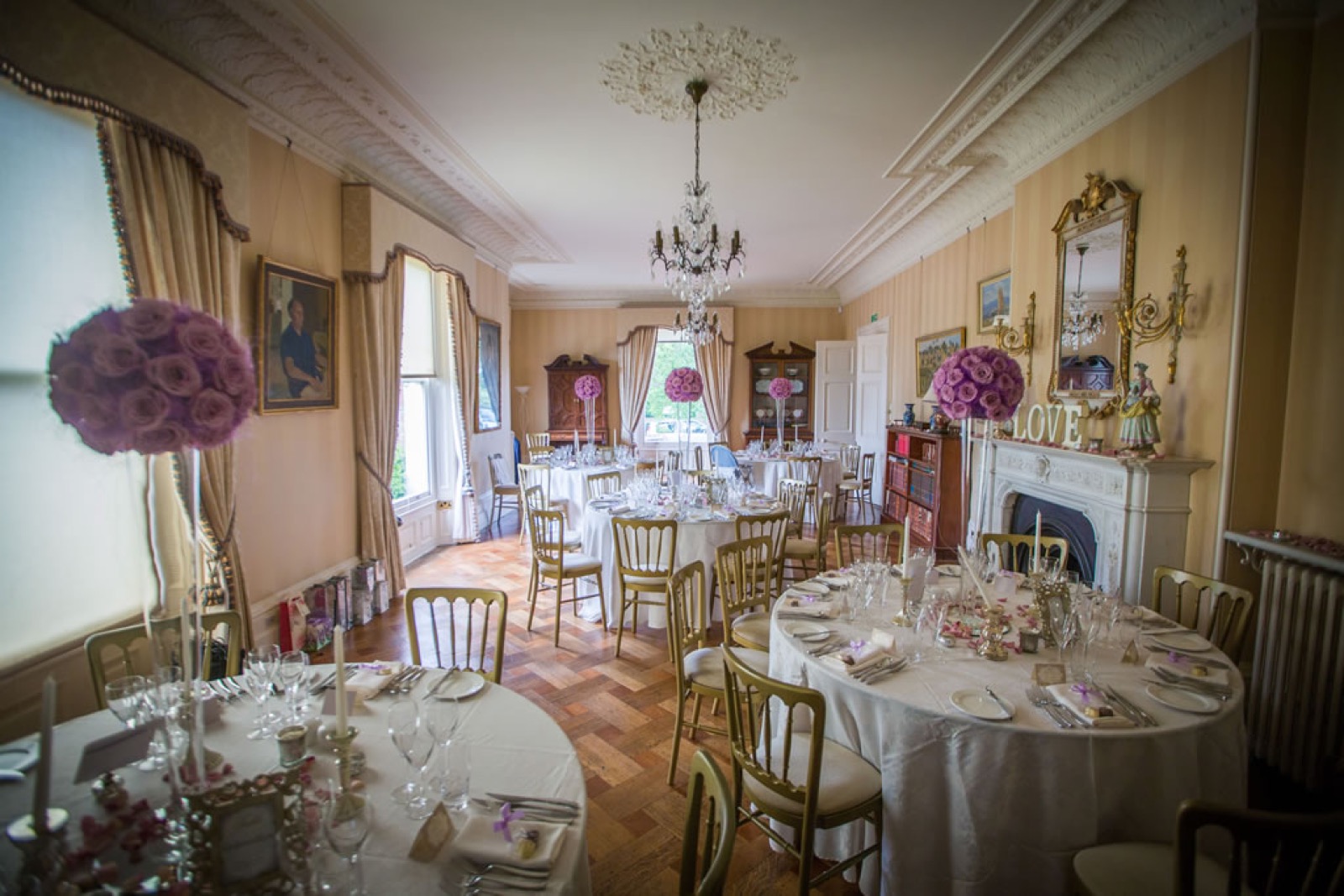Wedding reception tables in the manor house dining room