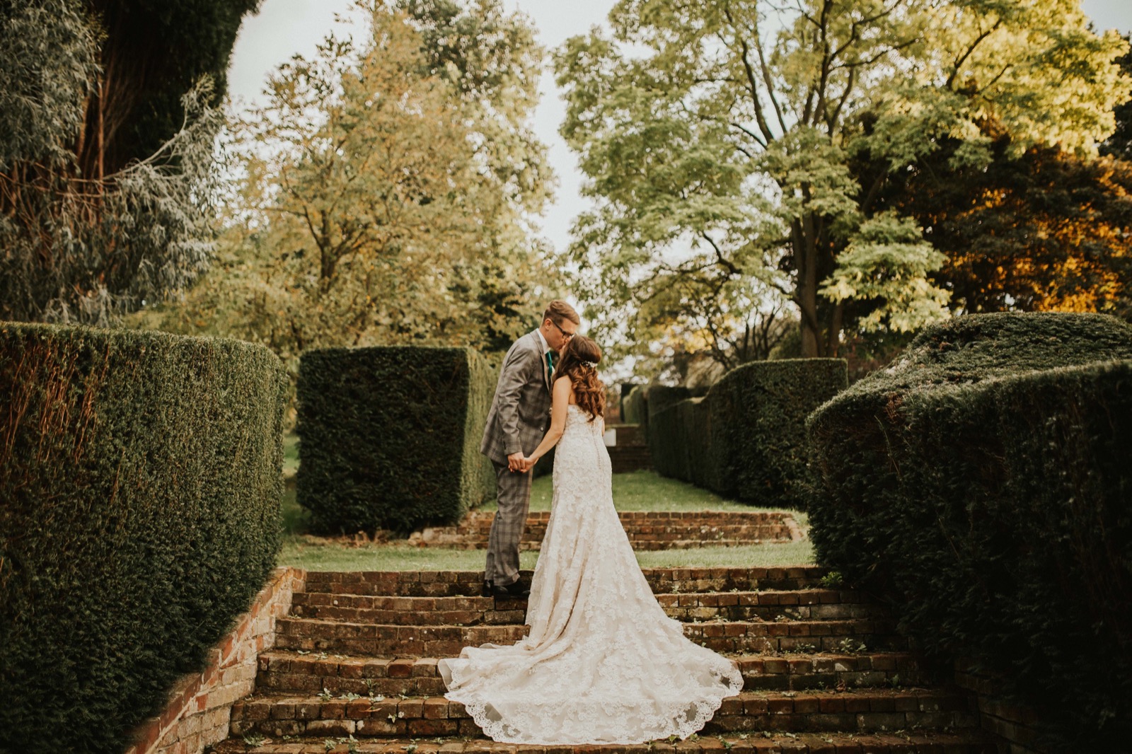 Wedding portraits on the garden steps at Mount Ephraim