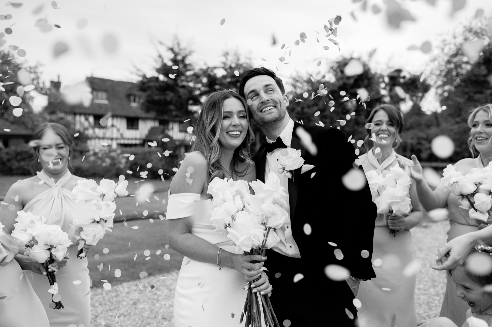 A couple celebrating with confetti at Oad Street
