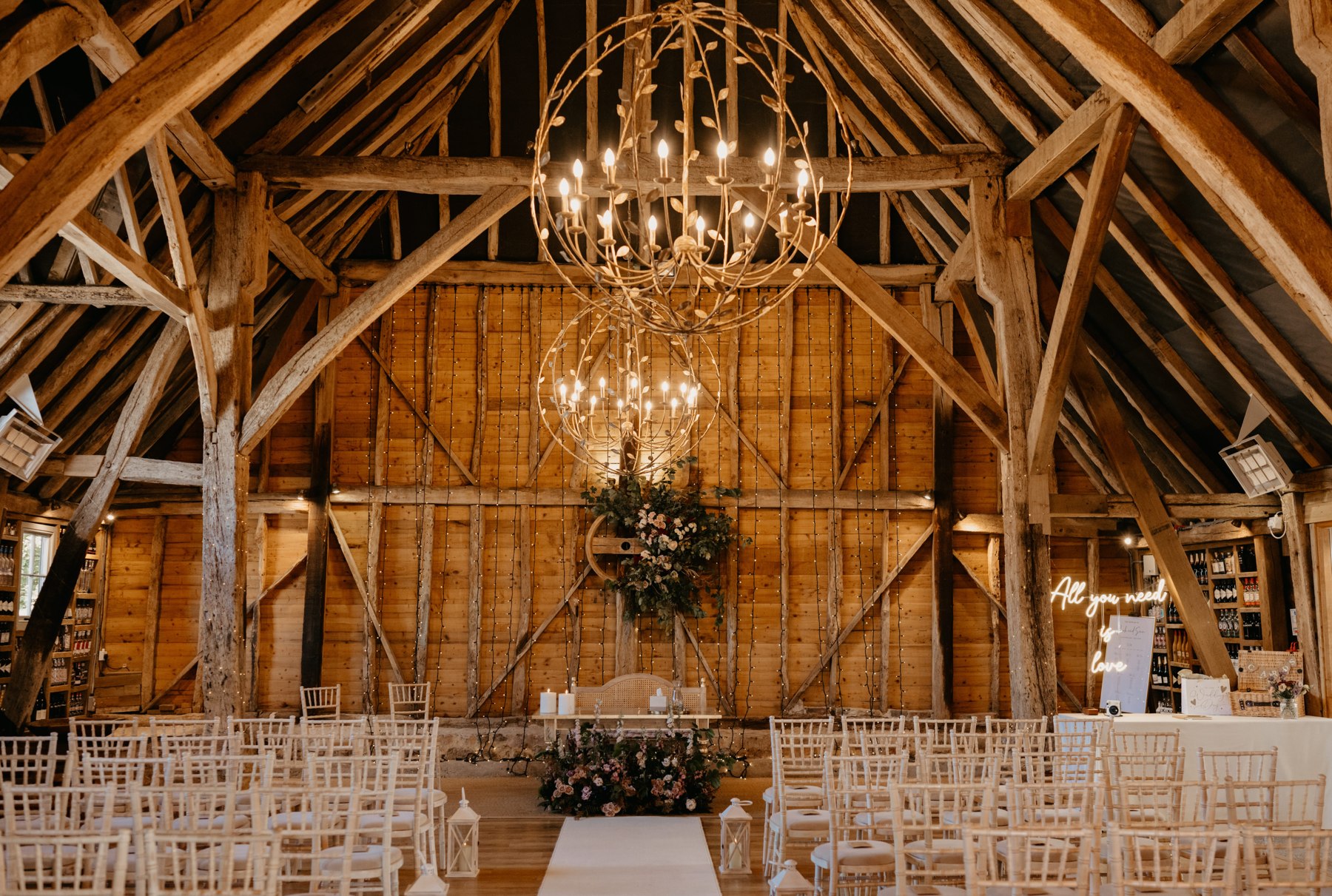 The timber barn prepared for a ceremony at Odo’s Barn
