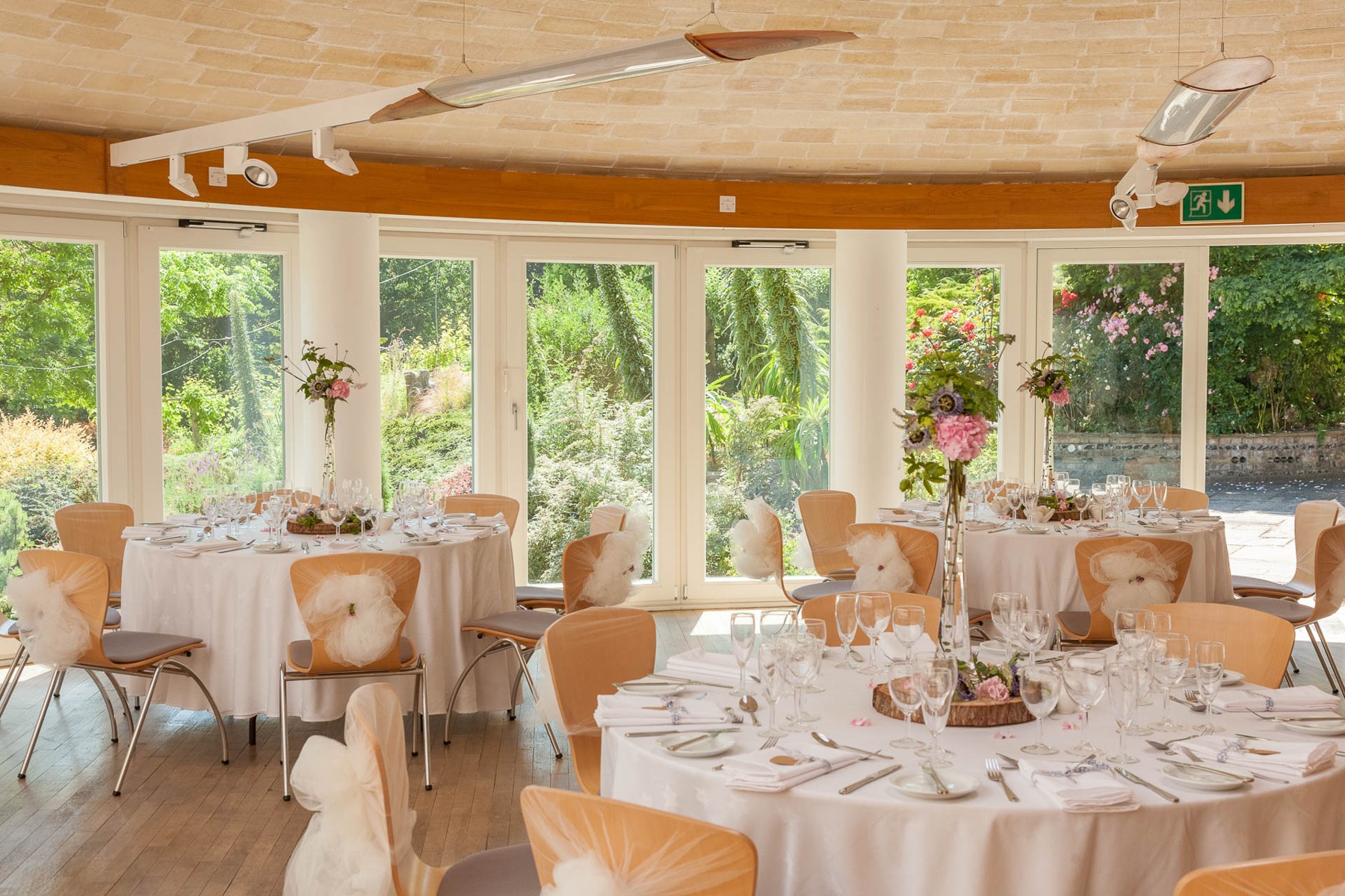 The reception room set for a wedding at The Pines Calyx