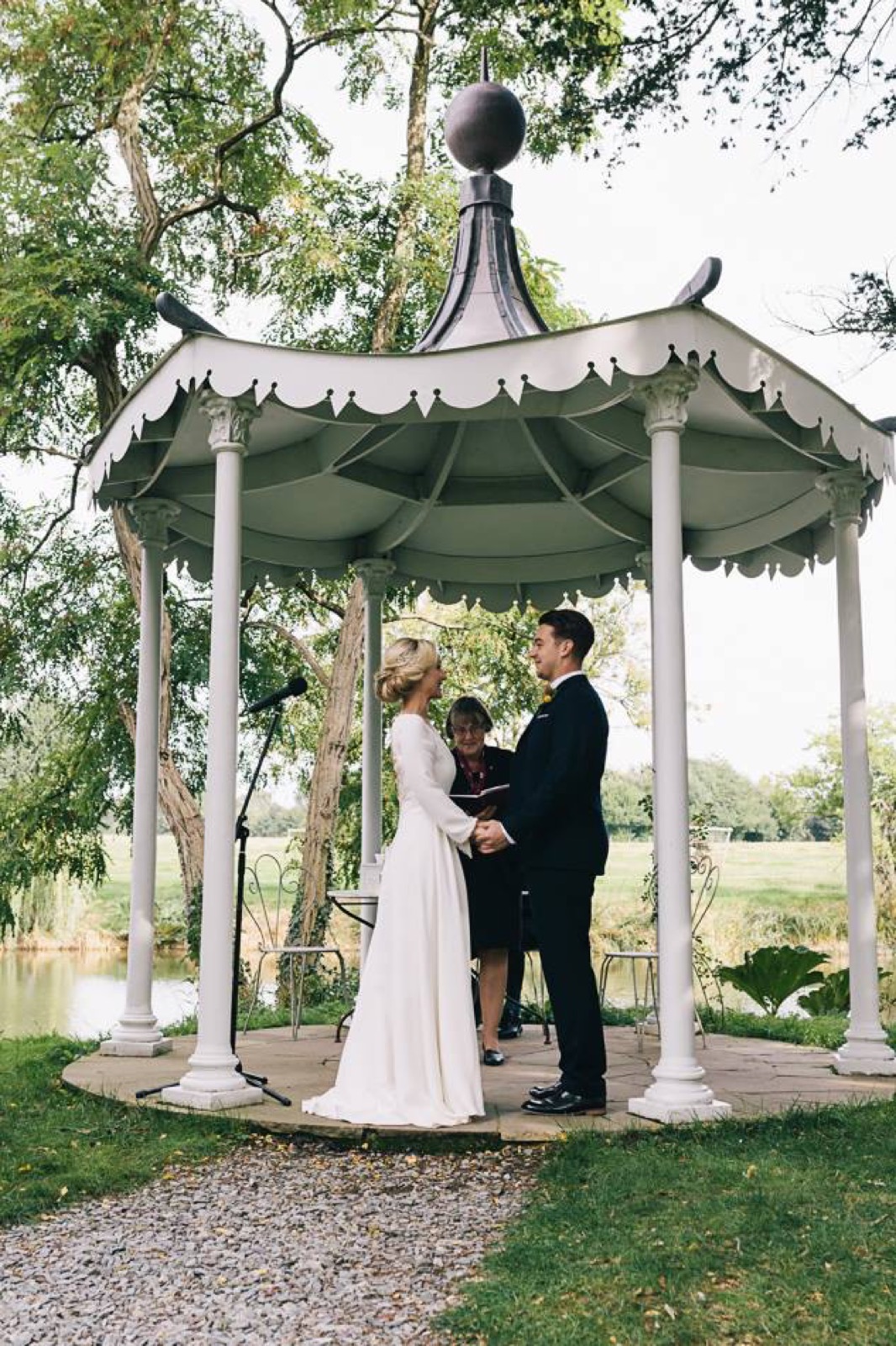 A wedding ceremony beneath the gazebo at Preston Court