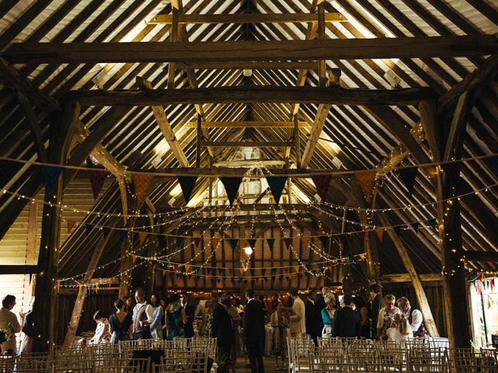 The timber barn prepared for a ceremony at Ruffynes Barn