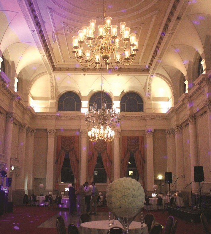 The hall’s chandeliers and high ceiling at The Corn Exchange