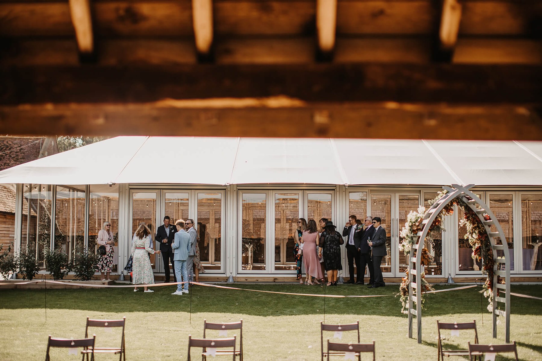 Guests outside the reception marquee at The Night Yard