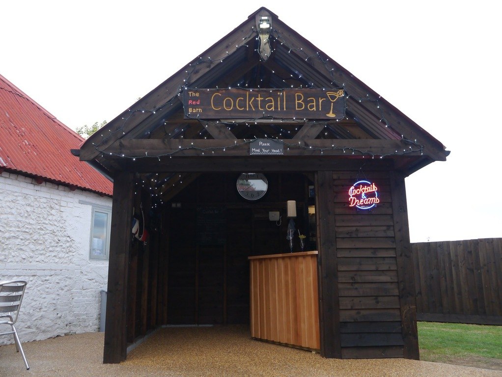 The rustic outdoor bar at The Red Barn