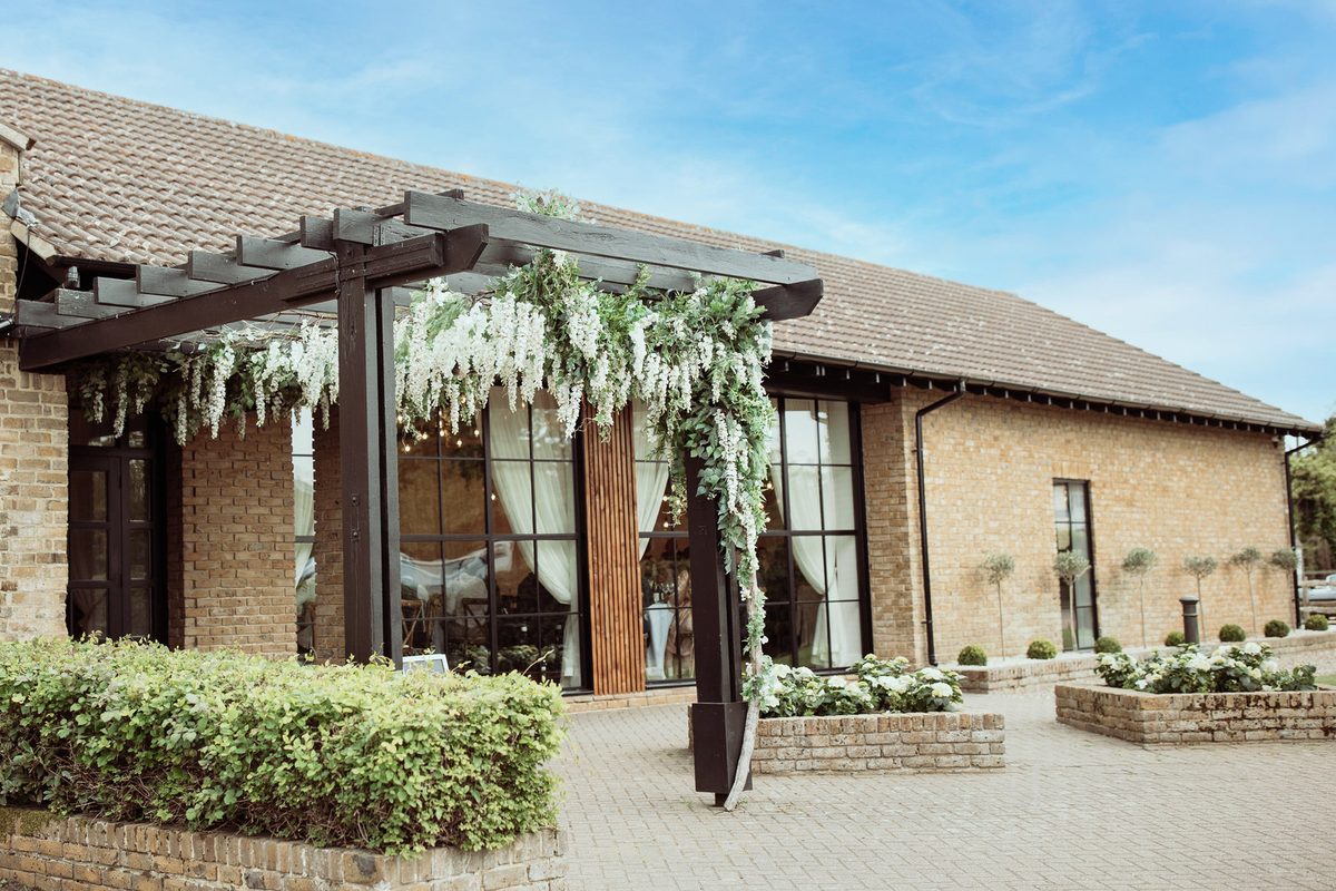 The wisteria-hung entrance at Oad Street