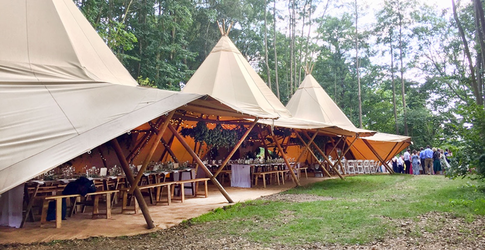 Giant tipis set for a wedding reception at Wilderness